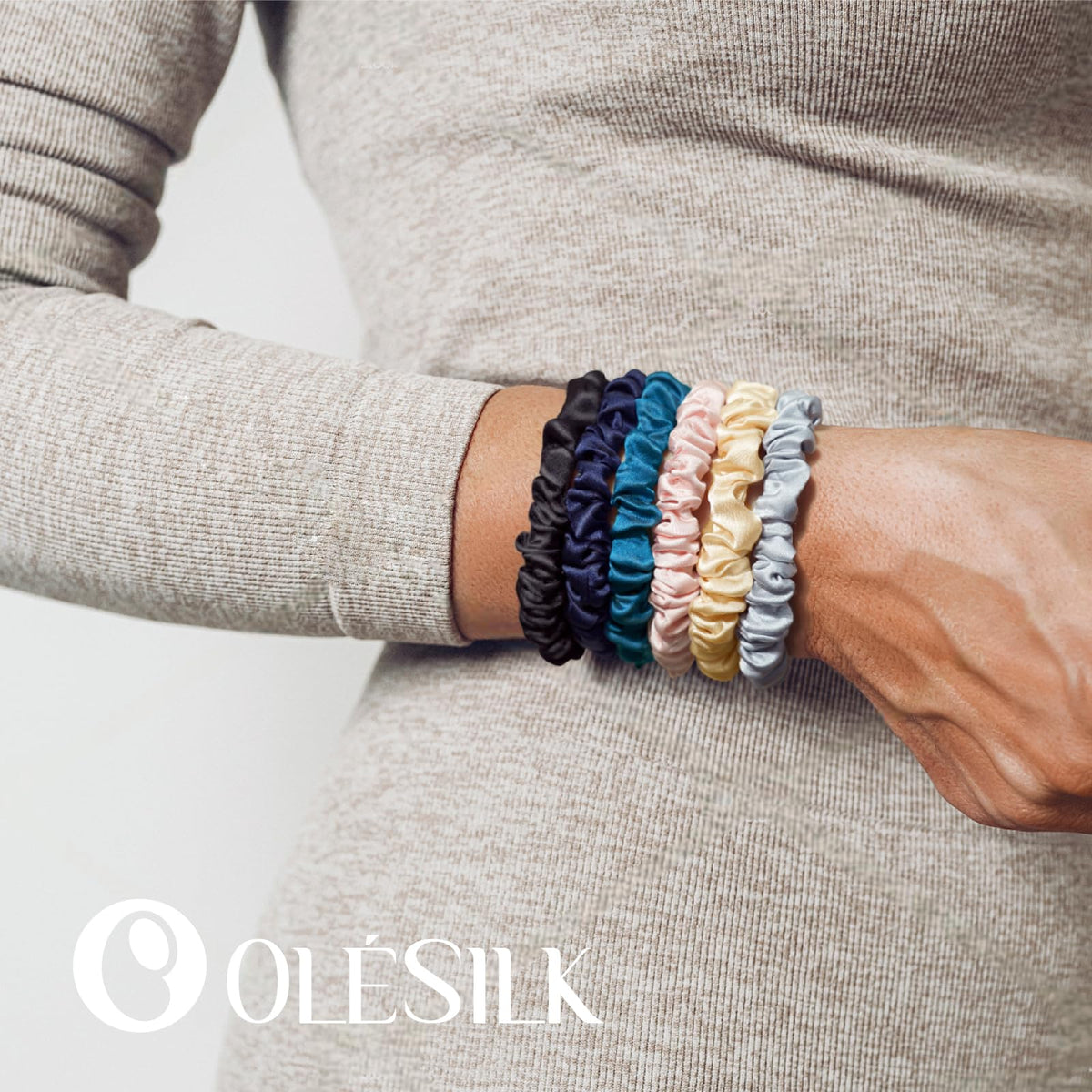 OLESILK scrunchie beside a ruler to show slim profile and size for fine hair