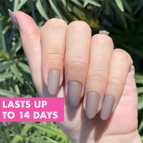 Olive & June application in hand demonstrating quick salon-quality benefit