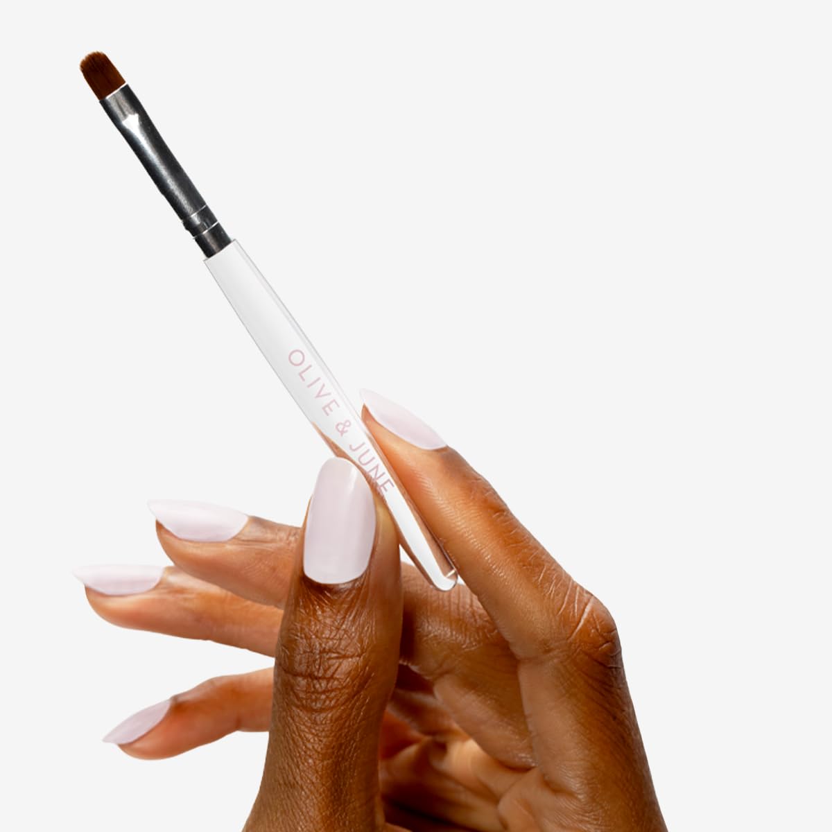 Olive & June acrylic handle detail for comfortable grip and improved control