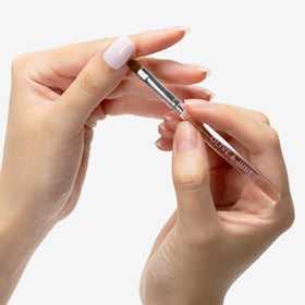 Olive & June close-up of rounded flexible tip for precise polish removal benefit