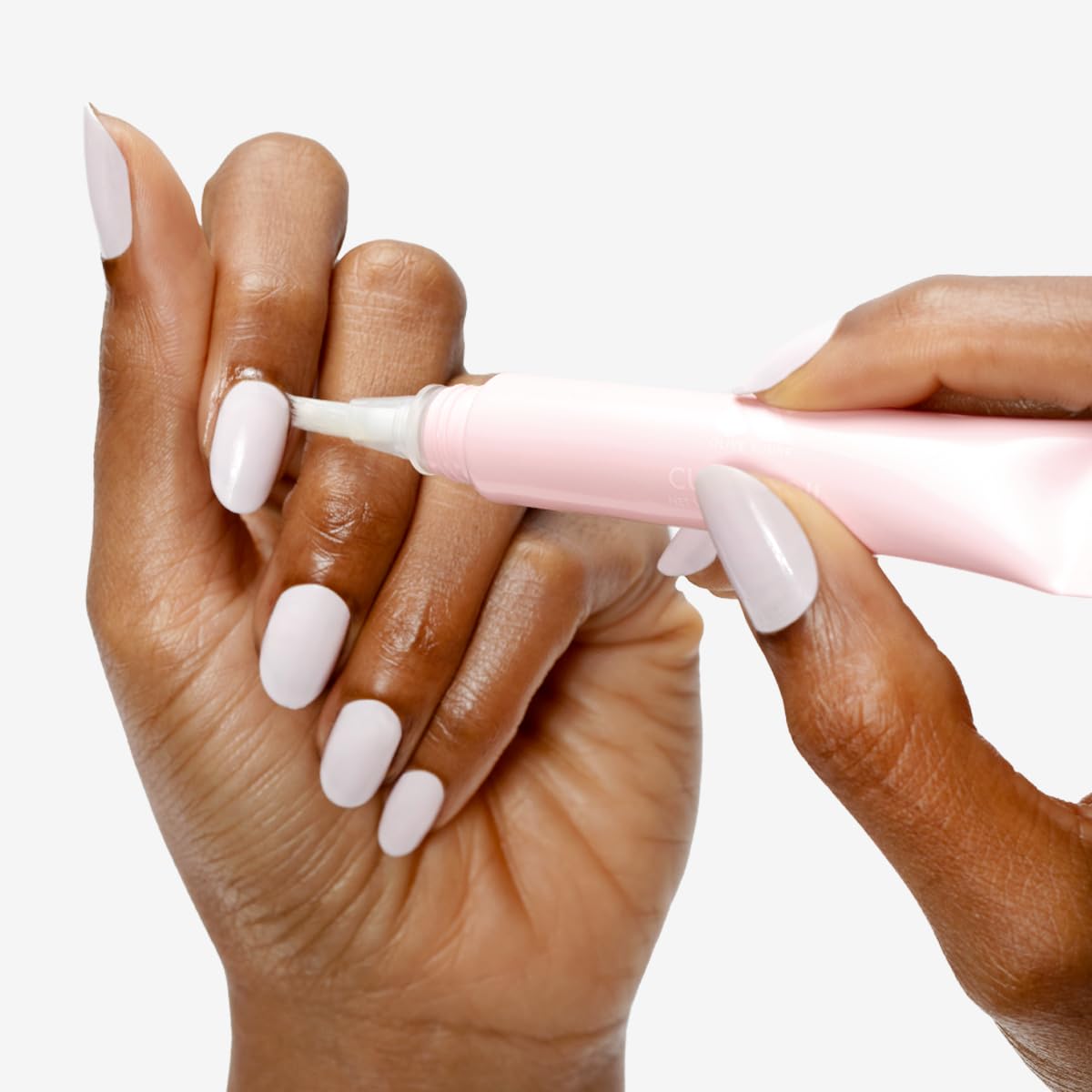 Olive & June close-up brush-tip applicator for precise application