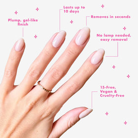 Olive & June Hibiscus swatch on nail tip for vibrant pink-red pop