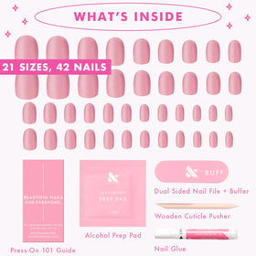 Olive & June mauve nails styled on desk for a lifestyle look and wearable benefit