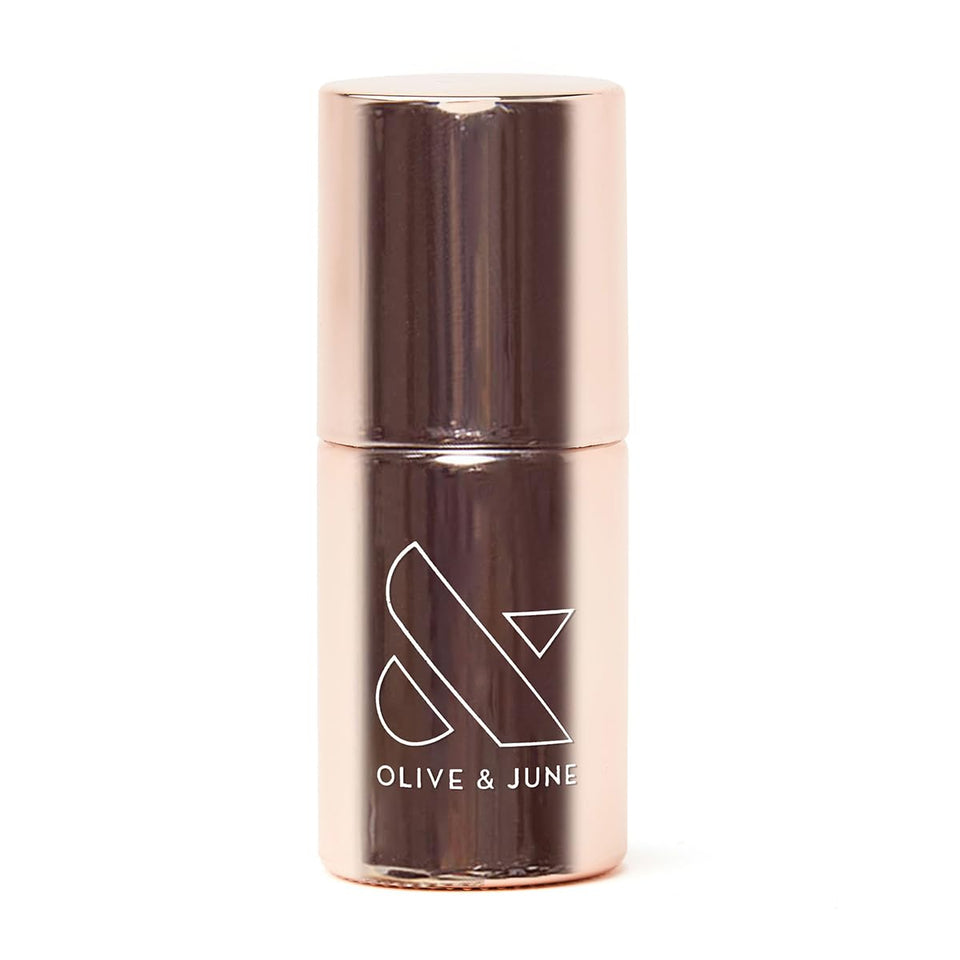 Olive & June front bottle view showing clean primer packaging and benefits