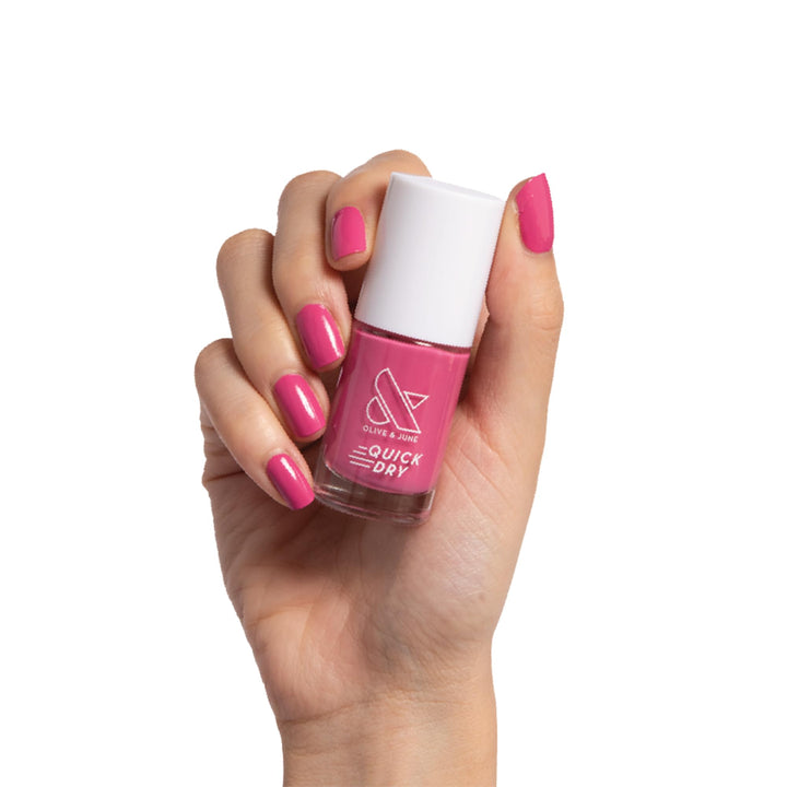 Olive & June bottle front packaging showing prom magenta and glossy finish