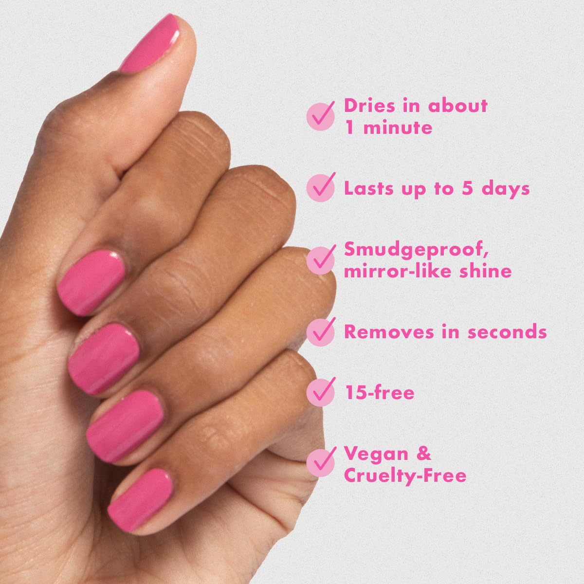 Applying Olive & June polish in hand to show easy, streak-free coverage