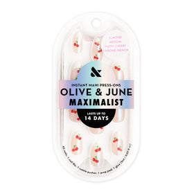 Olive & June close-up of Sharp French tip detailing realistic salon finish