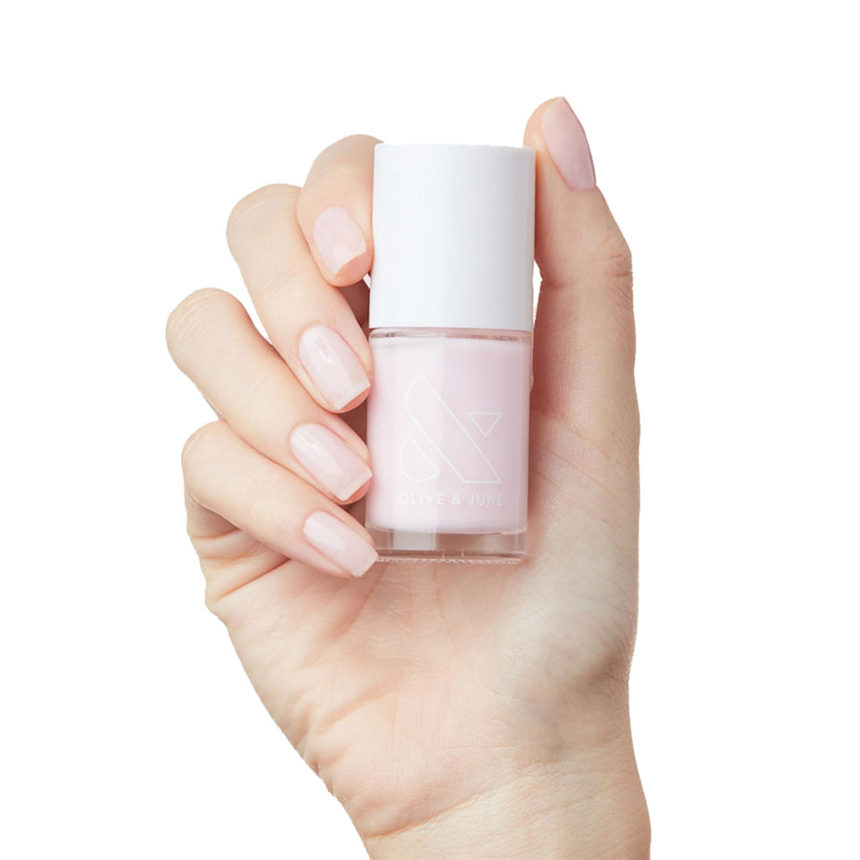 Olive & June bottle front view showing Strawberry Scone color and glossy finish benefit