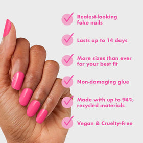 Olive & June hand model wearing Hot Strawberry press-ons demonstrating polished look