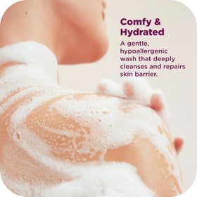 OLLY body wash on shower shelf styled for a calming bathroom routine
