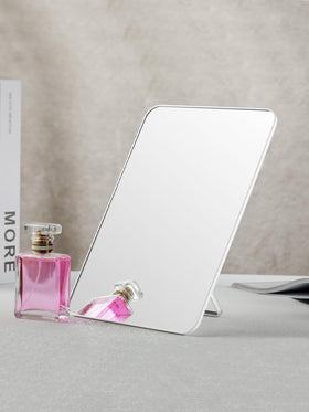 OMIRO on a desk with cosmetics illustrating convenient daily use and tidy grooming setup