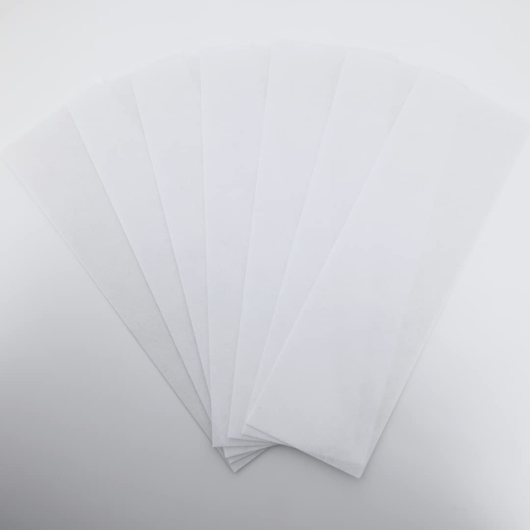OMWAH hand holding strip illustrating 3x9 inch scale for large areas