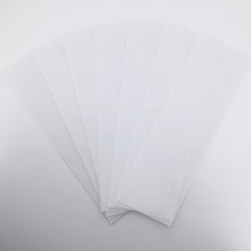 OMWAH hand holding strip illustrating 3x9 inch scale for large areas