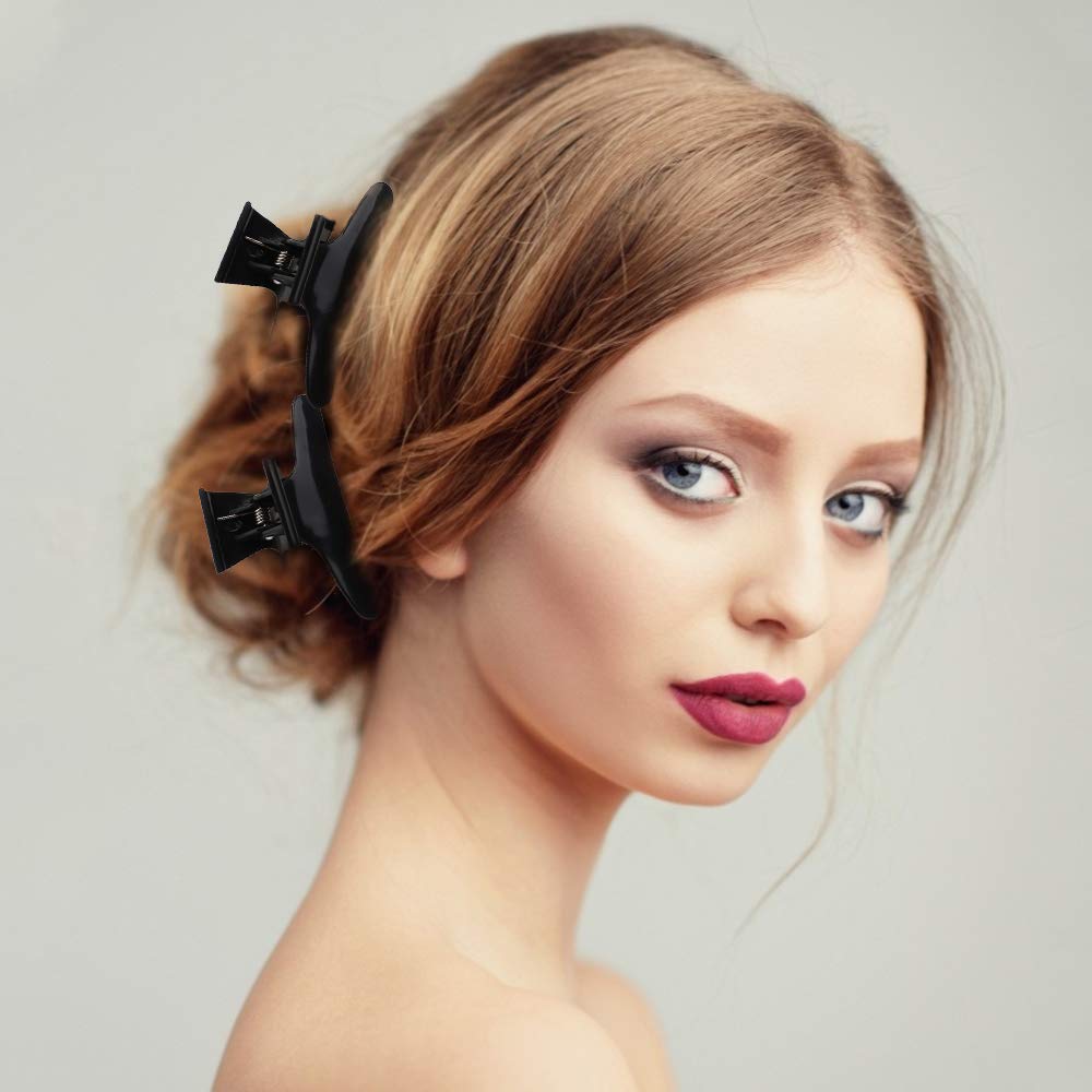 Ondder clip holding a hair section during styling for precise control