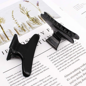 Ondder clip beside ruler demonstrating 3.2-inch length and scale