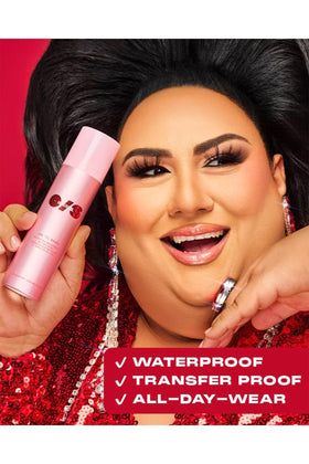 one size spray in use on model, brand helps longwear makeup