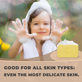One With Nature soap held in hand to show 7 oz bar size and travel-friendly scale
