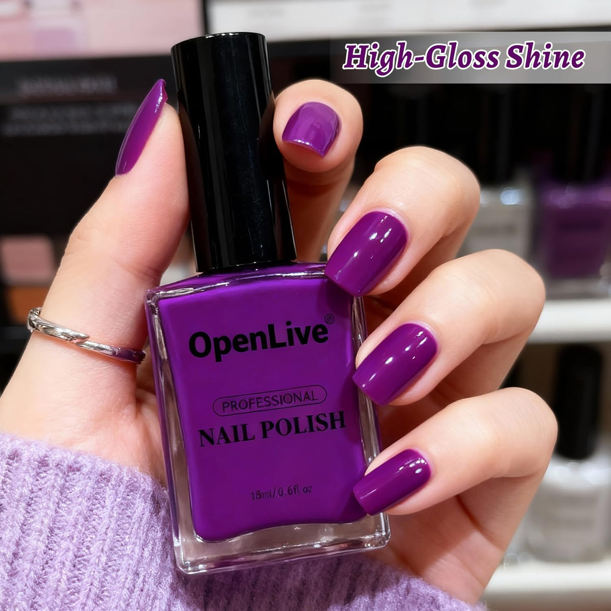 OpenLive polish on fingertips showing quick-dry glossy result
