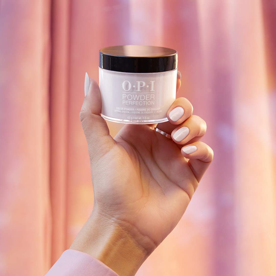 OPI activator in salon use applied to powder nails for faster curing