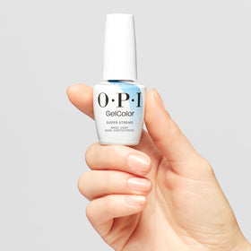 OPI bottle beside a coin for scale demonstrating compact 0.5 fl oz size portability