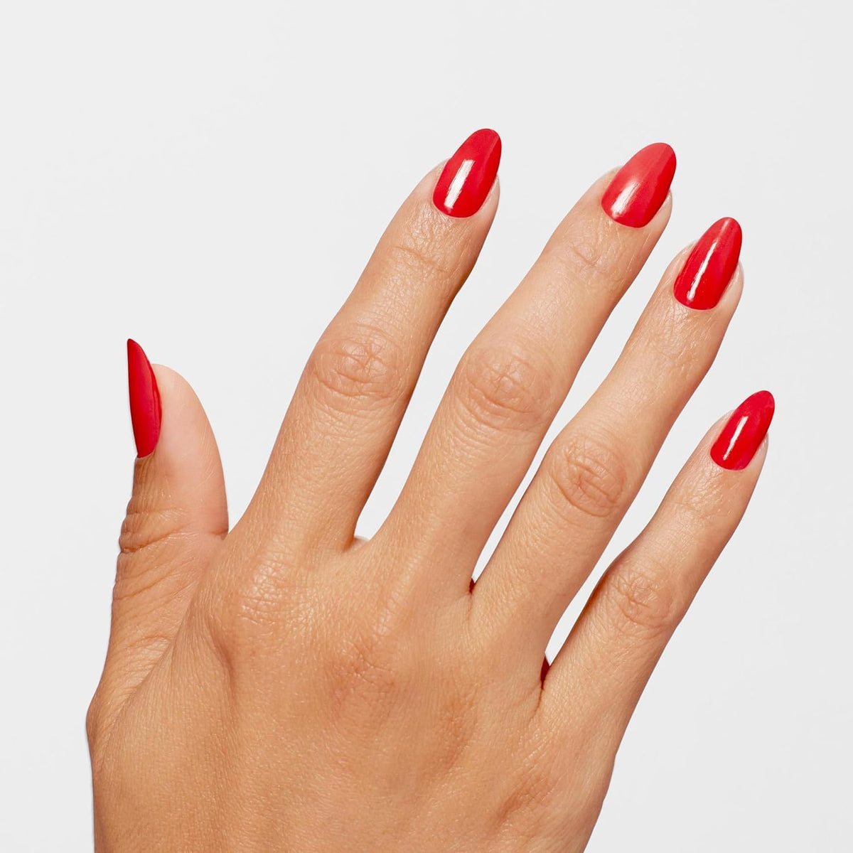 OPI Cajun Shrimp applied on nails close-up showing glossy, gel-like finish benefit