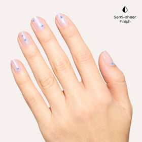 OPI Cosmic Chic bottle cap and label detail highlighting recycled-cap design and vegan formula
