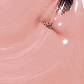 OPI Dulce de Leche angled bottle close-up highlighting brand label and salon-quality formula