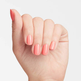 OPI painted nails on hand illustrating wearable peach-orange color benefit