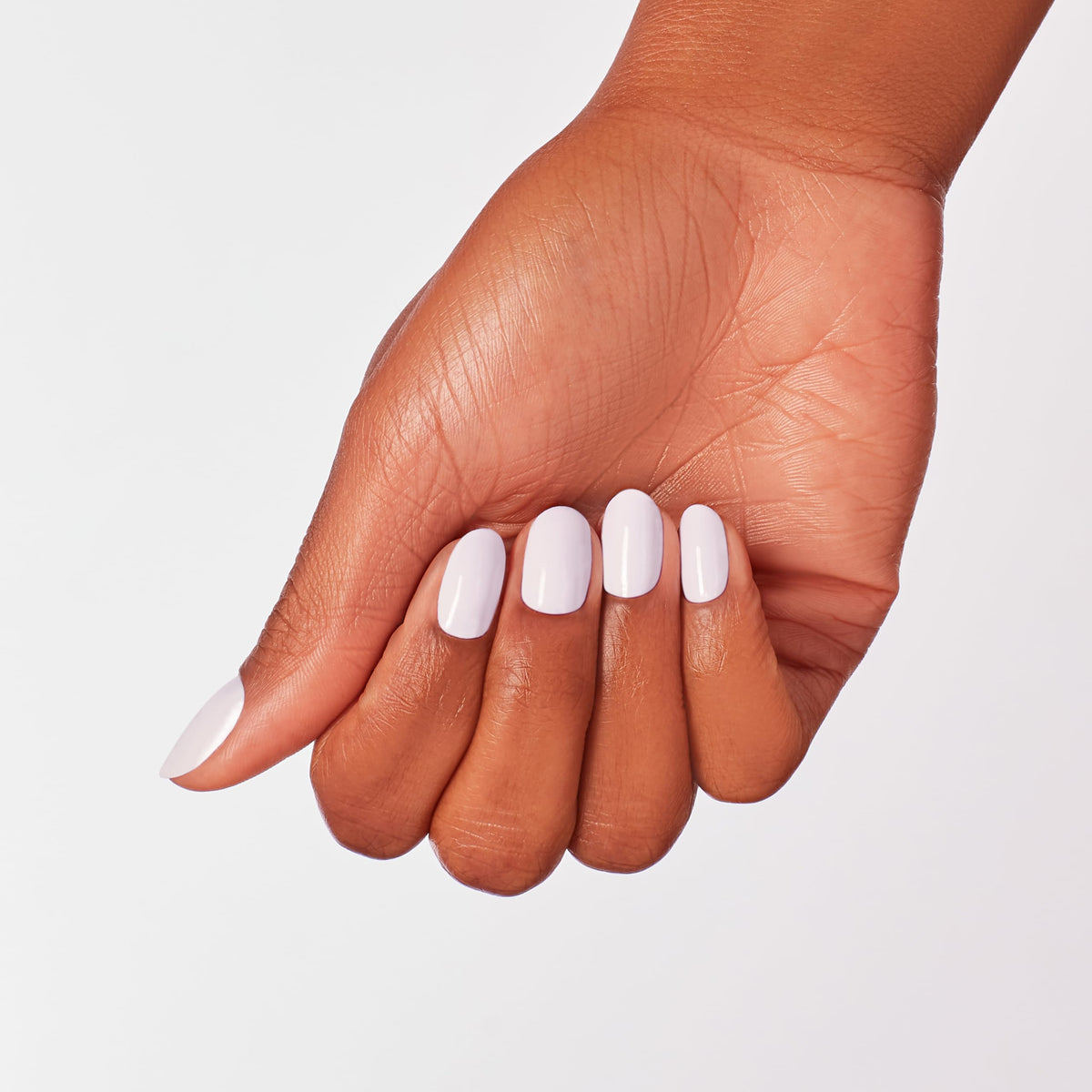 OPI swatch on nail wheel showing opaque soft white crème coverage