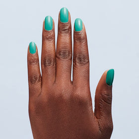 OPI pedicure toes in lifestyle setting showing vibrant summer-ready color