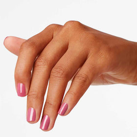 OPI nail swatch on hand showing opaque coverage and fast-dry benefit