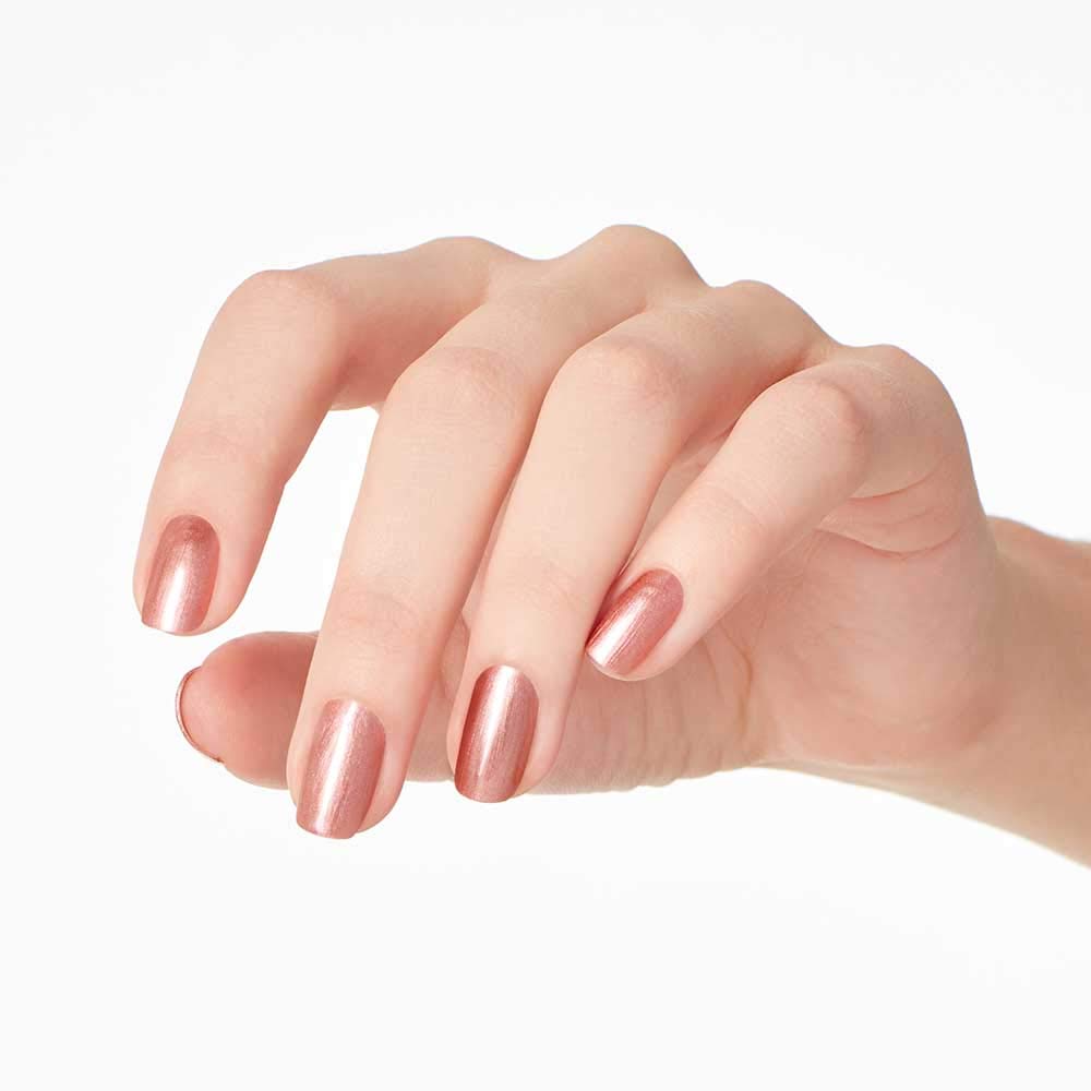OPI hand model wearing shade for subtle glam in everyday setting