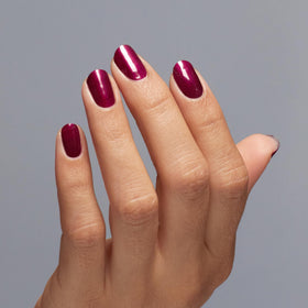OPI closeup on manicured nails showing pearl finish and salon‑quality shine