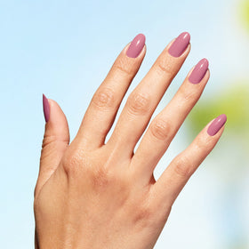 OPI polish on a hand demonstrating wearable soft pink for everyday elegance benefit