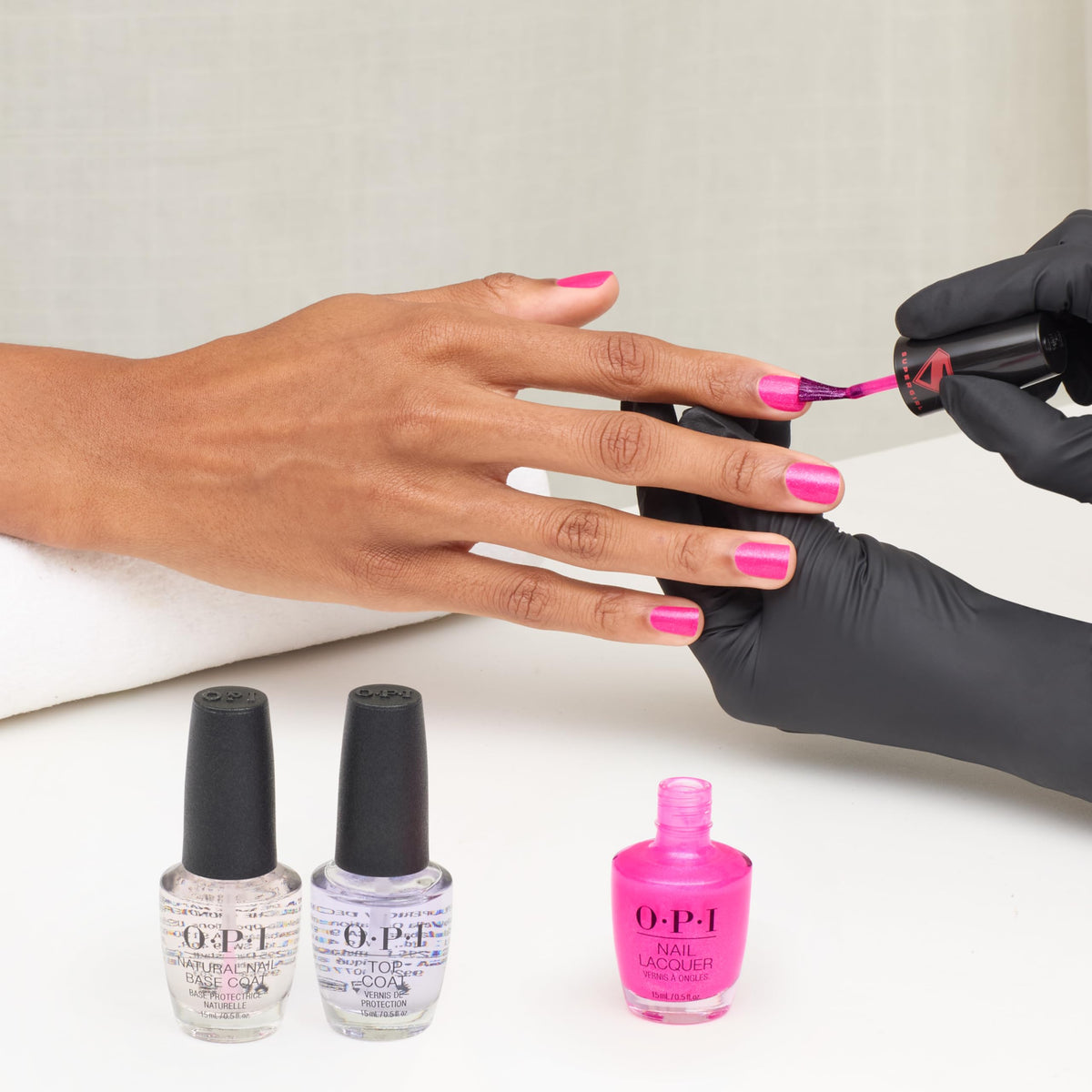 OPI Power Up Pink among Supergirl Collection bottles showing color coordination benefit