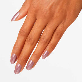 OPI swatch on hand demonstrating buildable sheer coverage and natural look