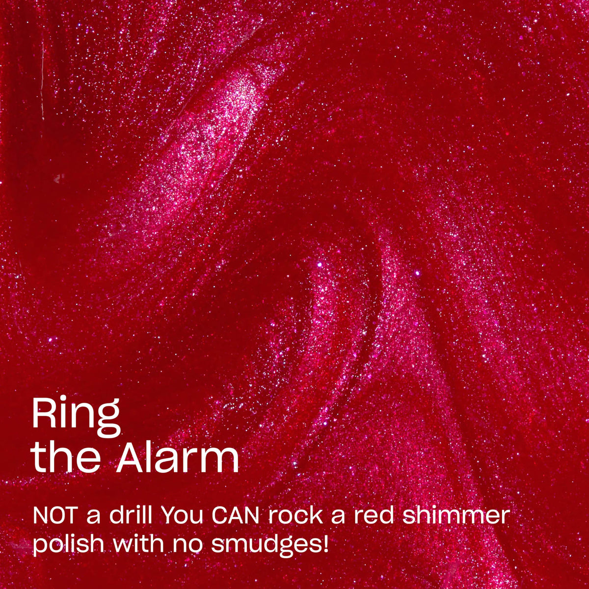 OPI swatch on nail wheels displaying opaque bright red shimmer payoff