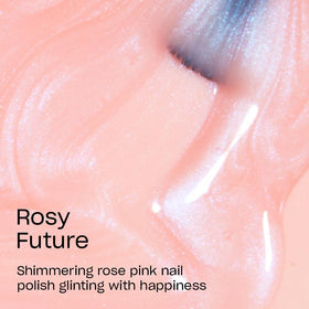 Hand swatch of OPI Rosy Future showing sheer pink, wearable look
