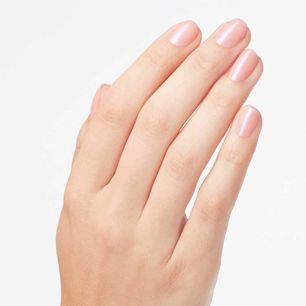 Pedicure swatch of OPI Rosy Future on toes, quick-dry confidence
