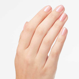 Pedicure swatch of OPI Rosy Future on toes, quick-dry confidence