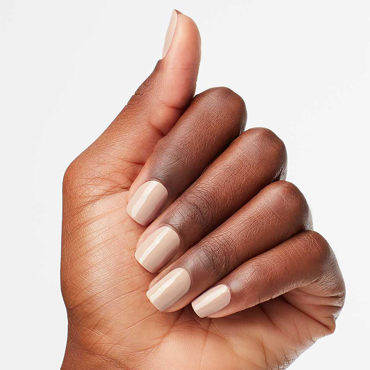 OPI application close-up of brush applying polish delivering salon-quality results