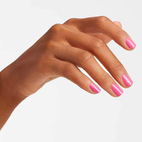 OPI Shorts Story applied on nails in a manicure showing bright pink color and glossy shine
