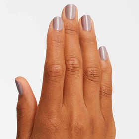 OPI on-nail swatch on hand showing opaque coverage and wearable neutral benefit
