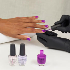 OPI bottle next to coin showing product size and travel-friendly benefit
