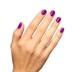 OPI swatch on skin highlighting warm orchid tone and color payoff