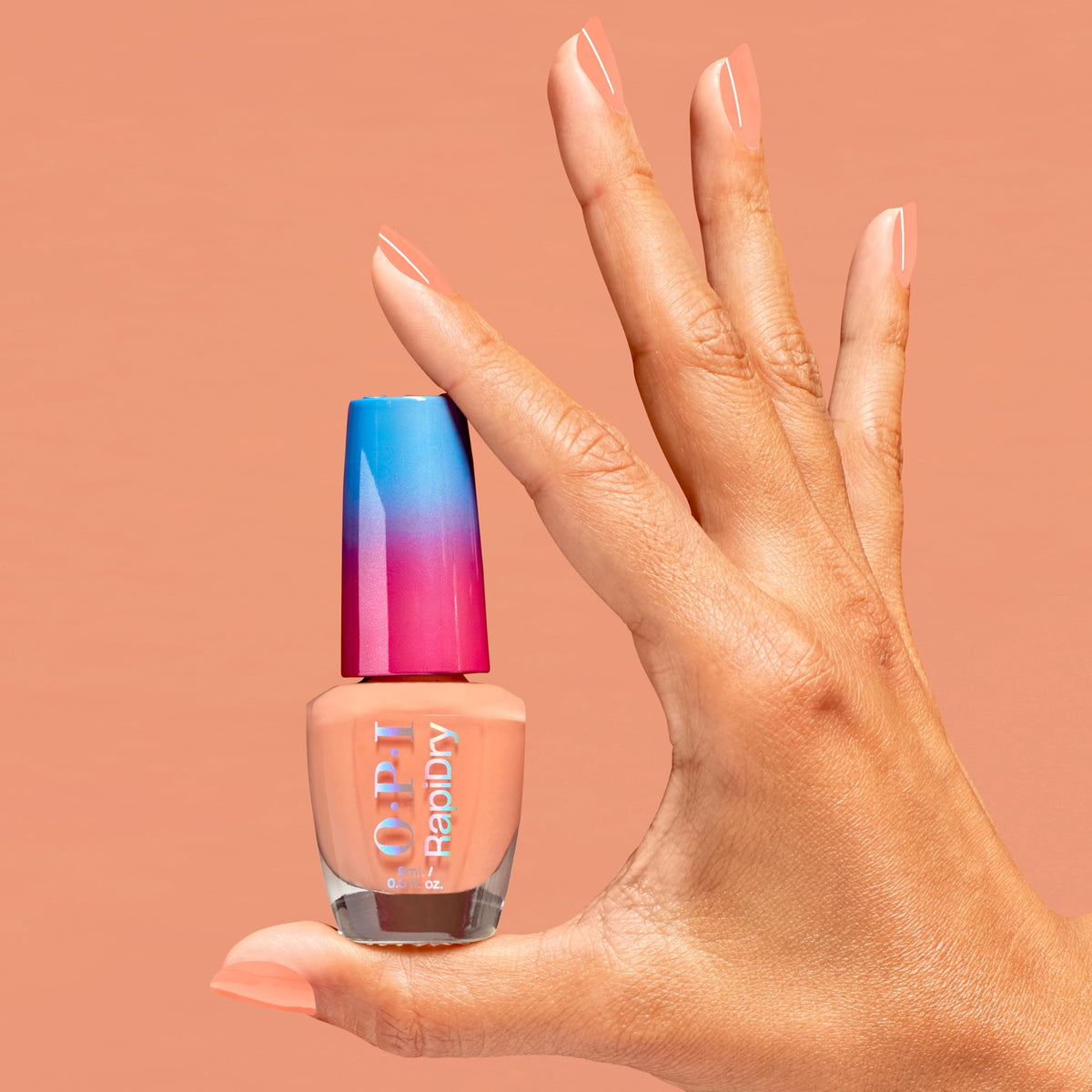 OPI within peach nail swatch on hand showing opaque color and long-wear benefit