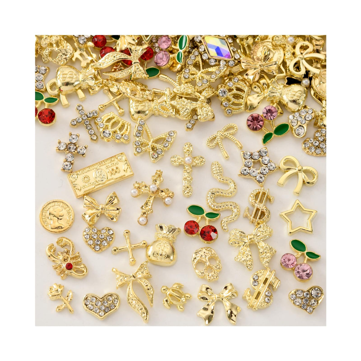 OPMADM front packaging showing full 100-piece gold nail charms set and benefit of variety