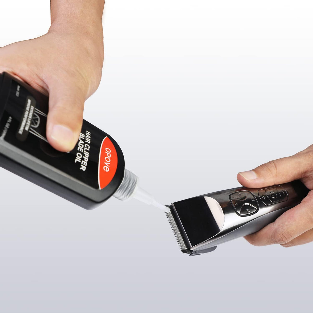 opove bottle next to clippers illustrates compatibility and convenient tool care