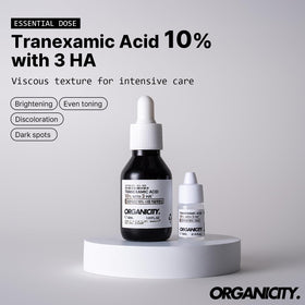 ORGANICITY dropper close-up dispensing clear serum, shows precise application benefit