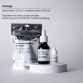 ORGANICITY bottle next to coin for scale, shows accurate size and travel-ready benefit